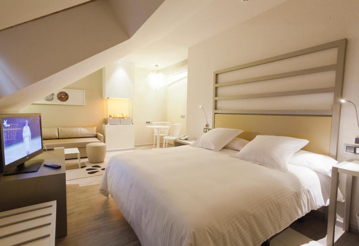 Cama o camas de una habitación en Hotel & Spa Princesa Munia