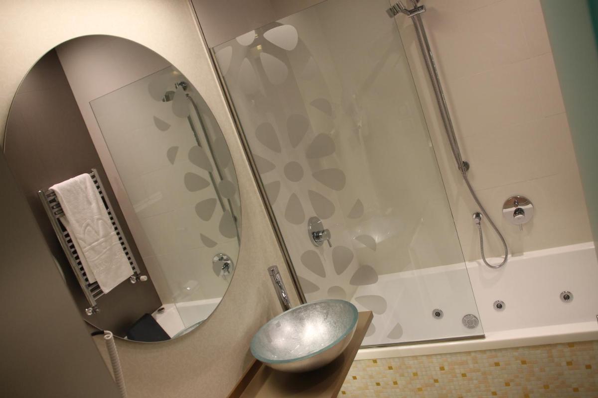 Un baño de Hotel & Spa Princesa Munia
