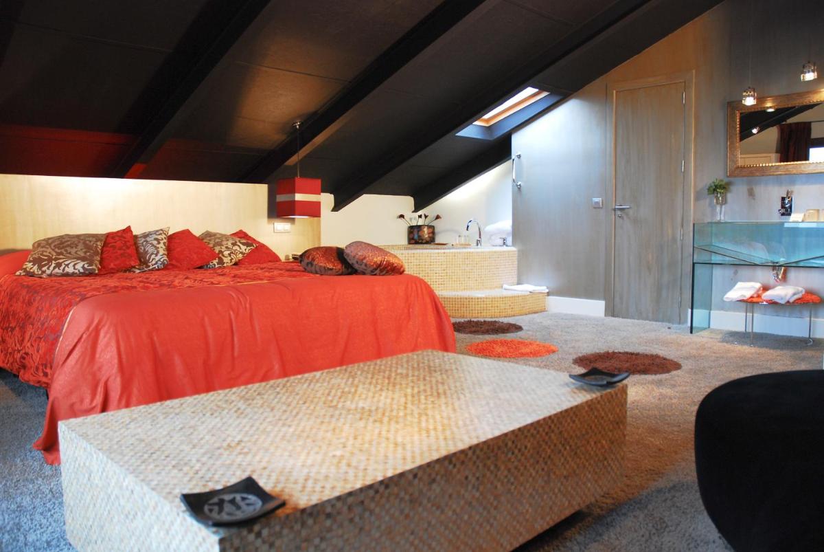 Cama o camas de una habitación en Hotel Cardamomo Sigüenza