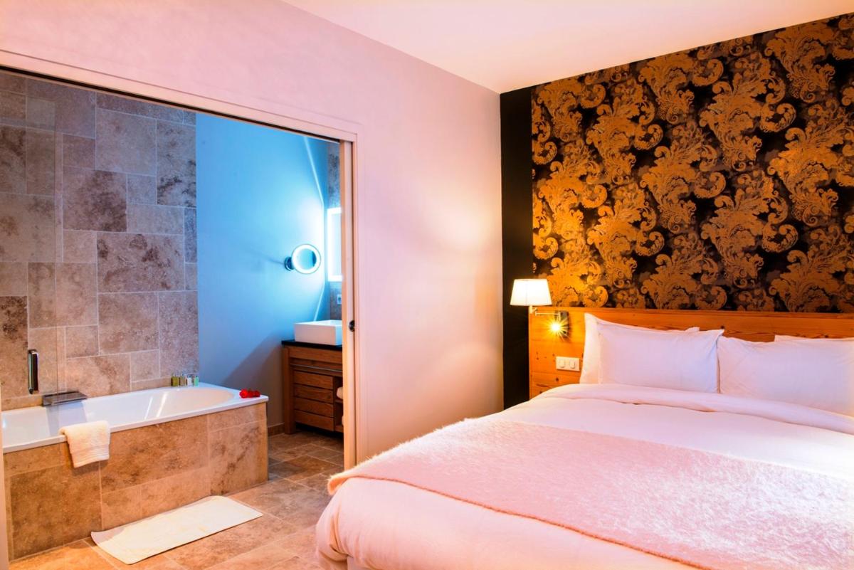 Un ou plusieurs lits dans un hébergement de l'établissement Château De Massillan