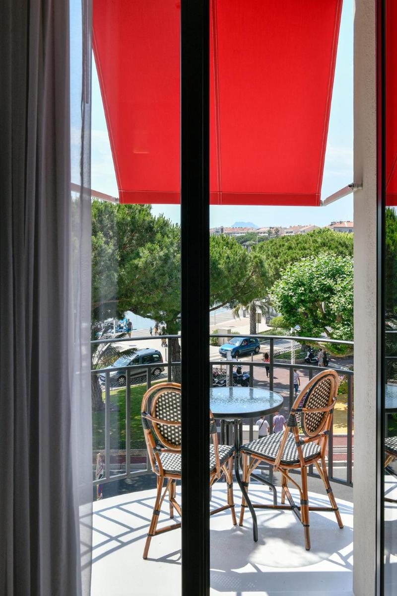 Balcon ou terrasse dans l'établissement Hôtel Restaurant le Touring - Teritoria