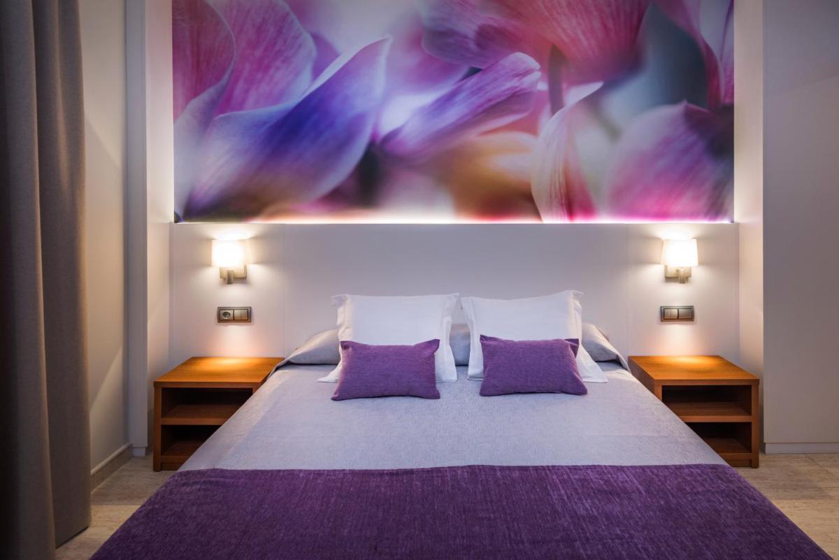 Cama o camas de una habitación en Sumus Hotel Monteplaya & SPA 4Sup - Adults Only
