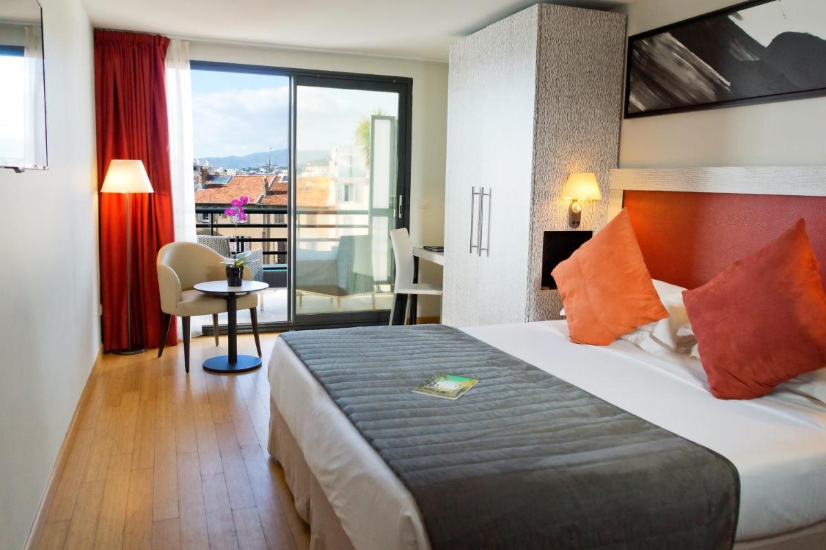 Un ou plusieurs lits dans un hébergement de l'établissement Eden Hotel & Spa