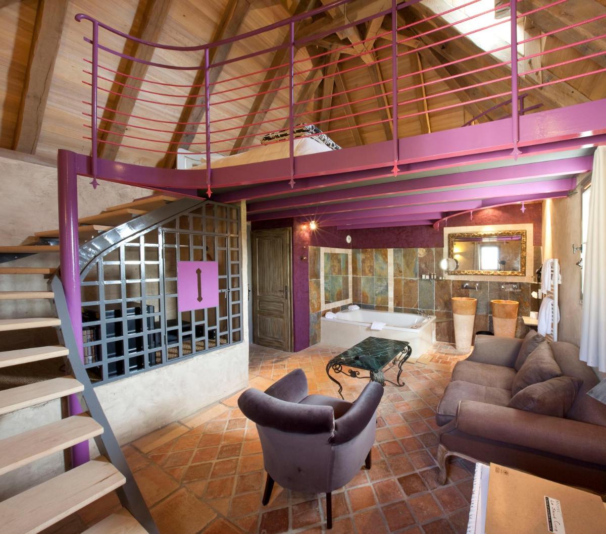 Coin salon dans l'établissement Hôtel-Spa Le Saint Cirq
