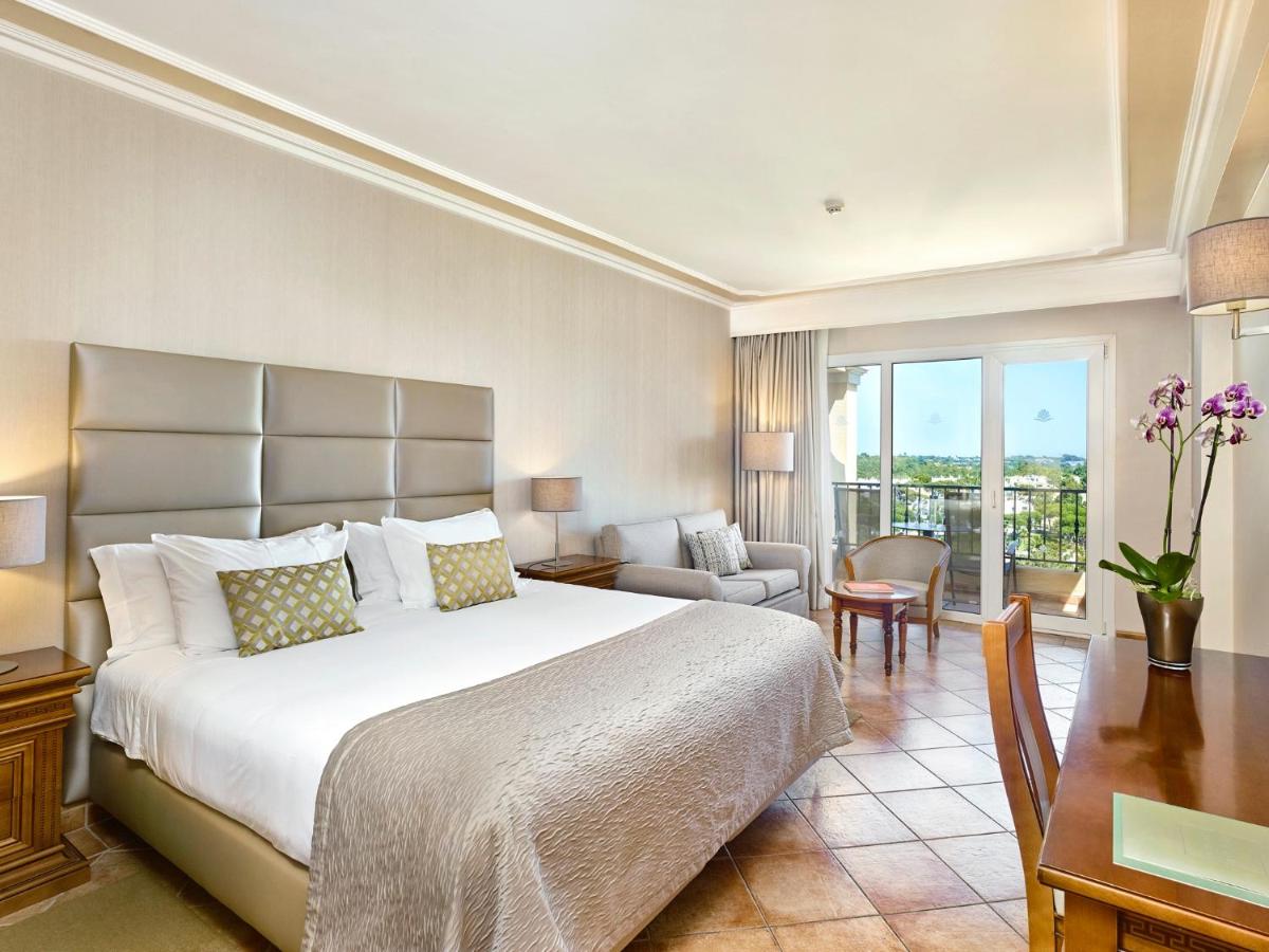 Uma cama ou camas num quarto em Ria Park Hotel & Spa