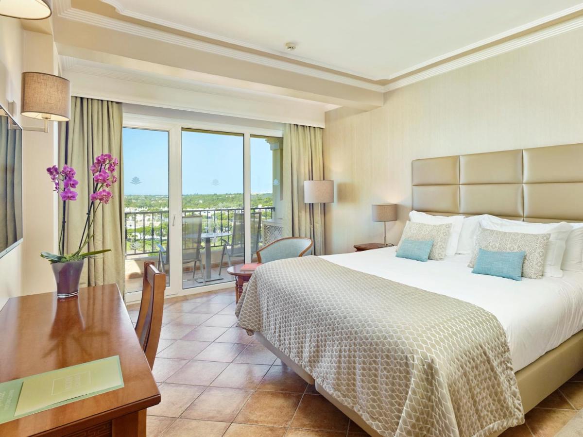 Uma cama ou camas num quarto em Ria Park Hotel & Spa