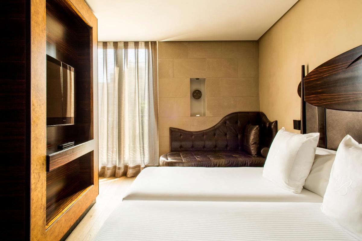 Cama o camas de una habitación en Hotel Bagués, a Small Luxury Hotel of the World