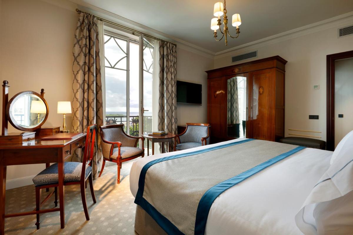 Cama o camas de una habitación en Eurostars Hotel Real