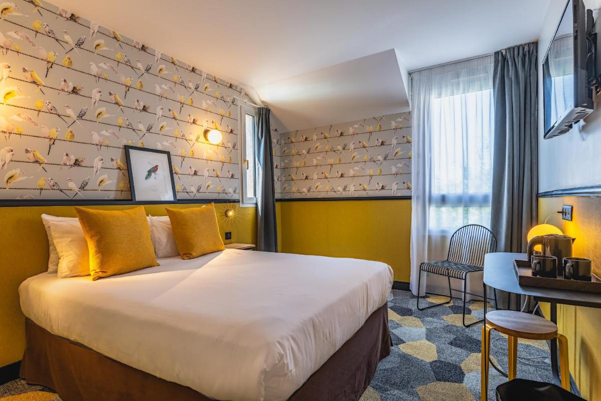 Un ou plusieurs lits dans un hébergement de l'établissement Best Western Hôtel Grand Parc Marne La Vallée