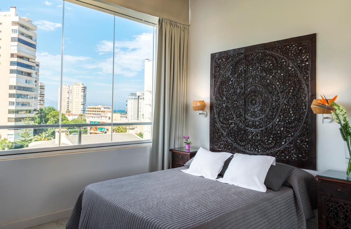 Cama o camas de una habitación en Essence Hotel Boutique