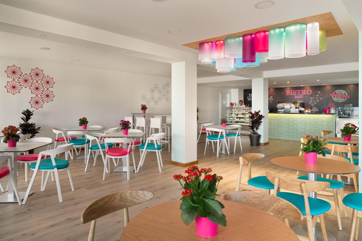 Un restaurante o sitio para comer en H10 Rubicón Horizons Collection