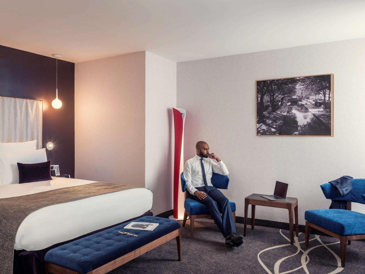 Un ou plusieurs lits dans un hébergement de l'établissement Mercure Paris Opera Garnier Hôtel & Spa