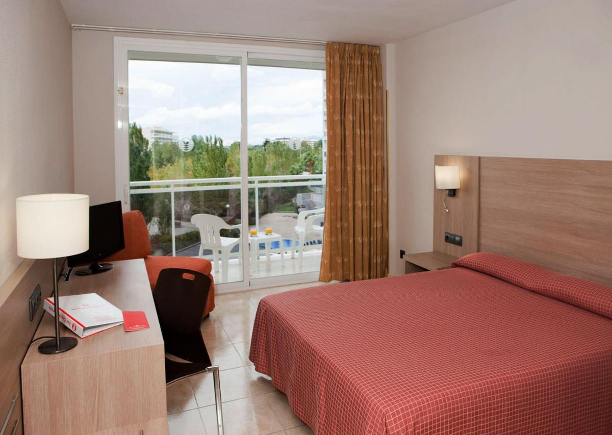 Cama o camas de una habitación en Sol Costa Daurada
