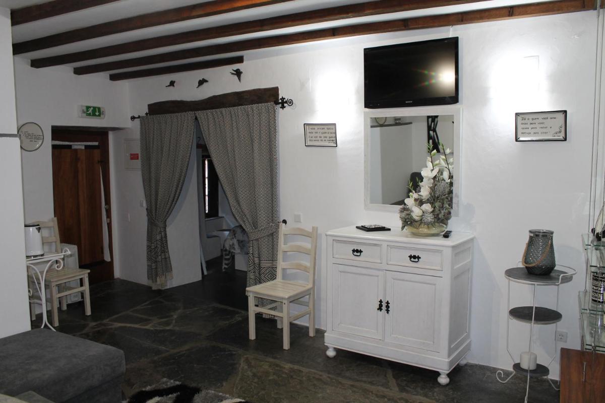 Casa da Muralha Suíte - Housity