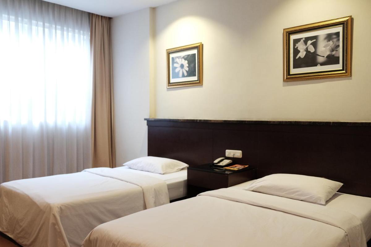 Grand Sakura Hotel - Housity