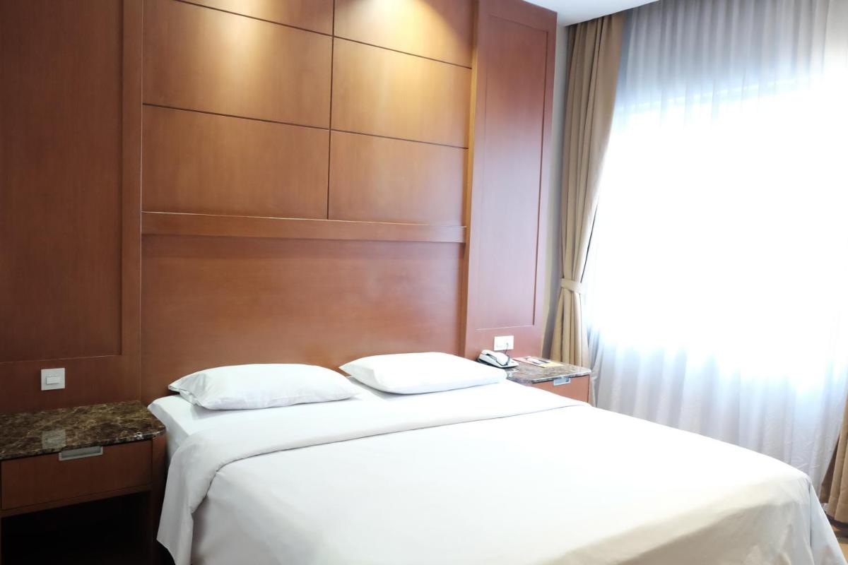 Grand Sakura Hotel - Housity