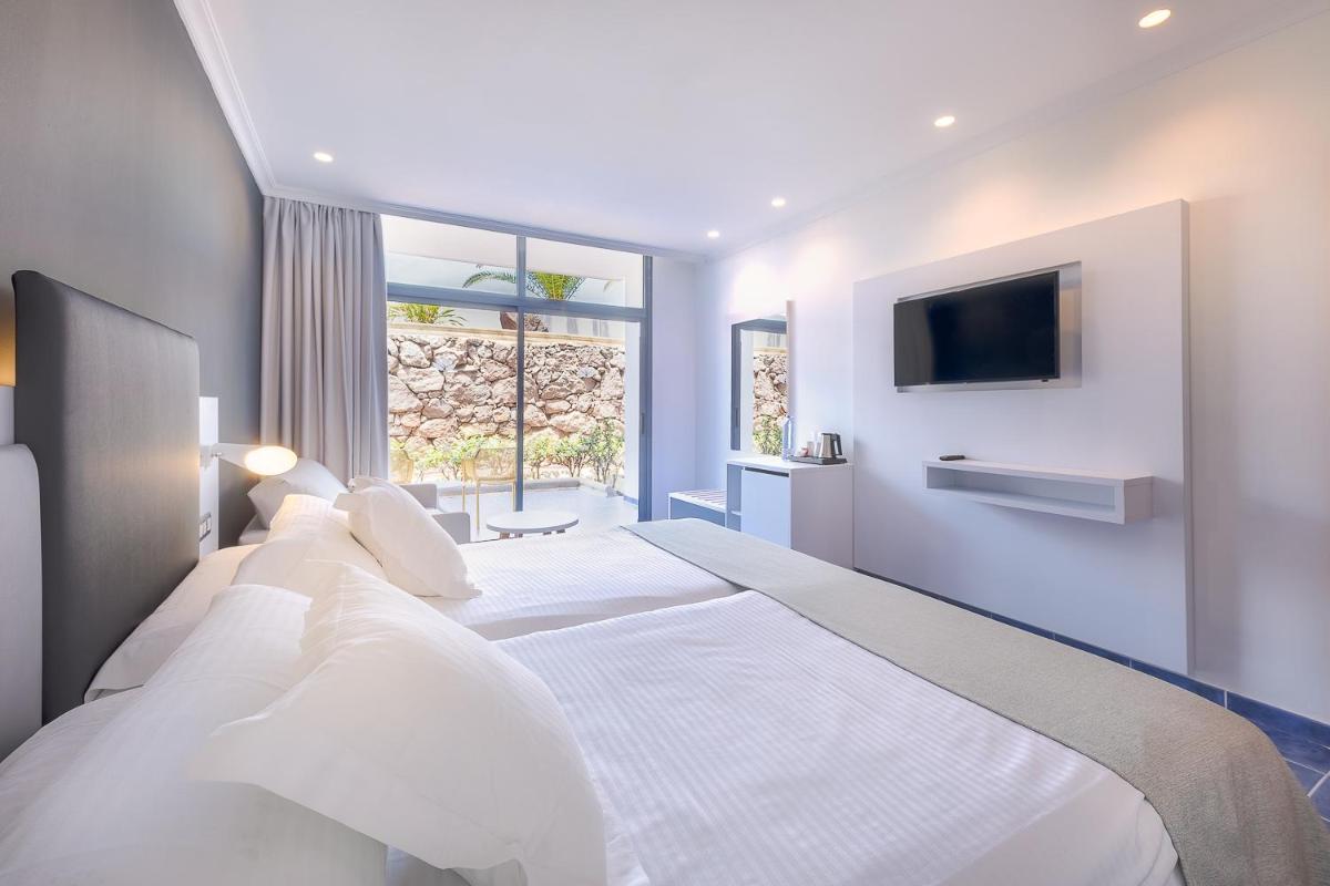 Cama o camas de una habitación en Hotel Mirador Papagayo by LIVVO