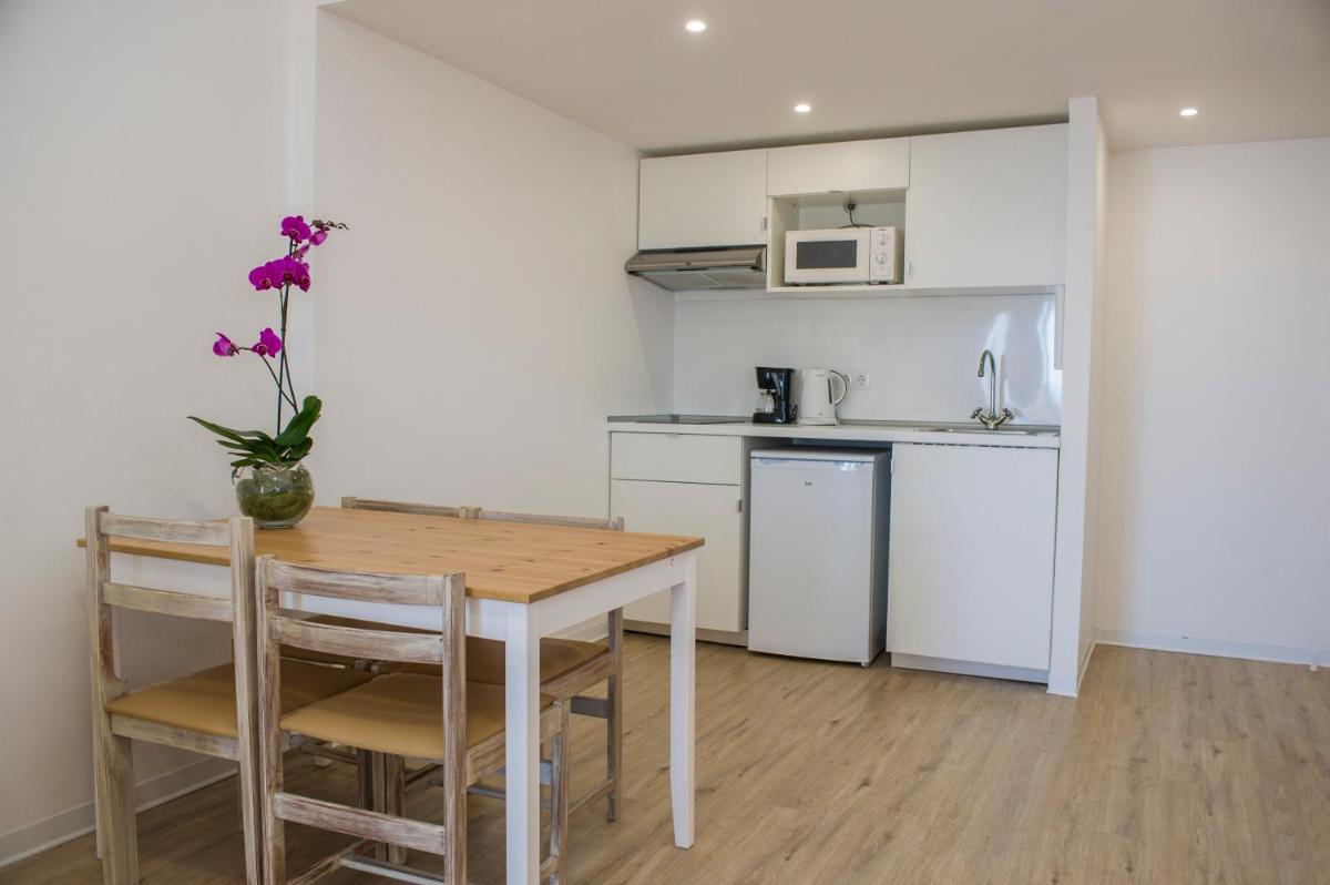 A cozinha ou kitchenette de Florasol Residence Hotel - Dorisol hotels
