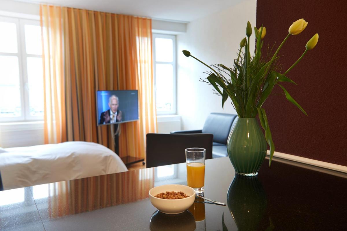 Residence Apartments by Hotel du Commerce - Housity