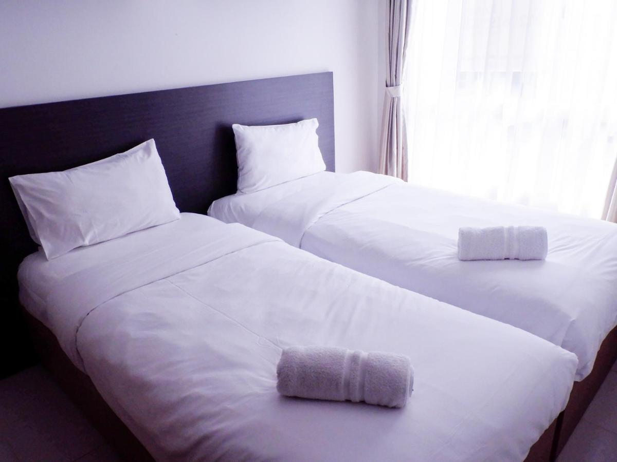 Cozy 1BR Scientia Residence Apartment near Summarecon Mall Gading Serpong By Travelio - Housity