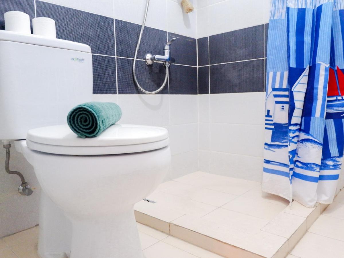 Cozy 1BR Scientia Residence Apartment near Summarecon Mall Gading Serpong By Travelio - Housity