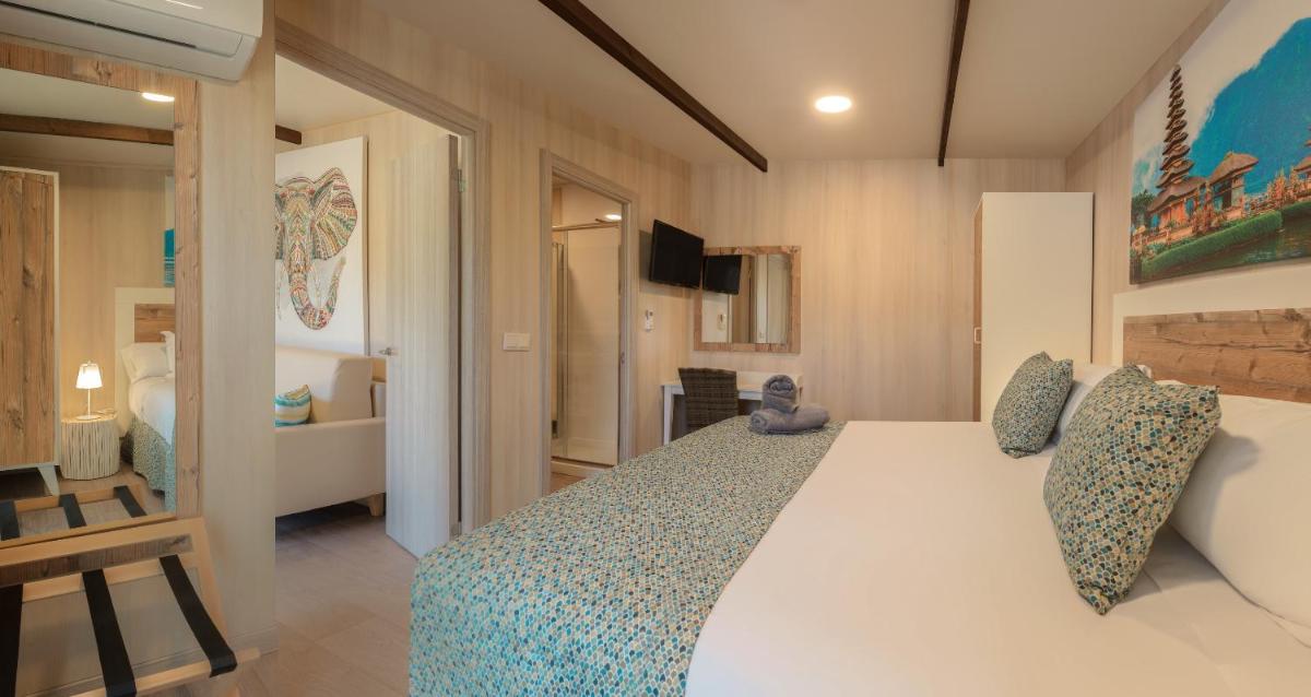 Cama o camas de una habitación en Magic Natura Resort