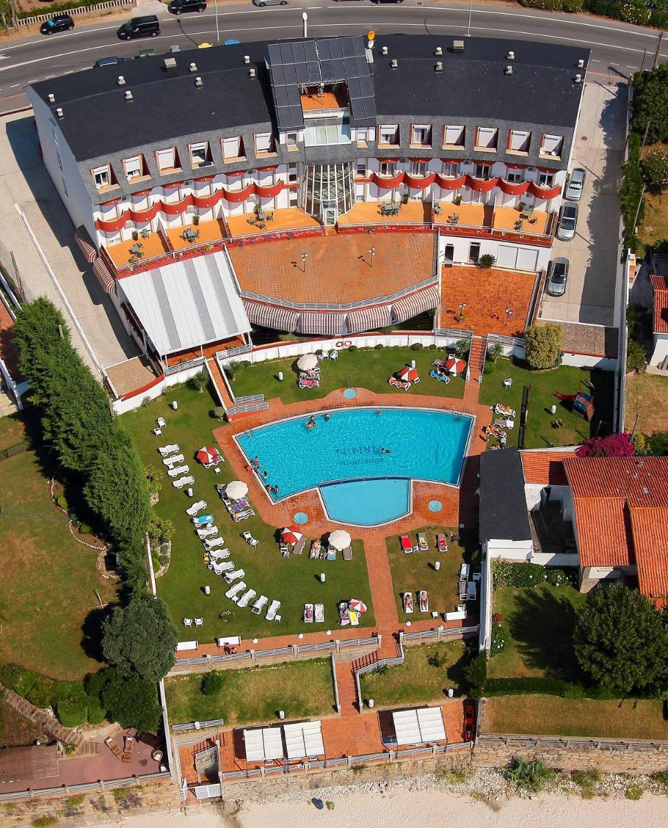 Piscina en o cerca de Hotel Spa Nanin Playa