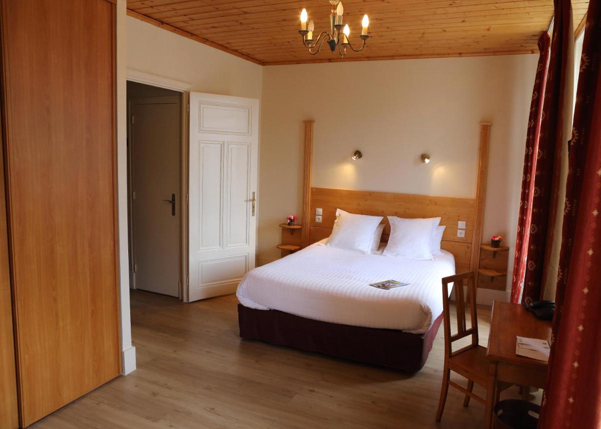 Un ou plusieurs lits dans un hébergement de l'établissement Best Western Grand Hotel de Paris & Spa