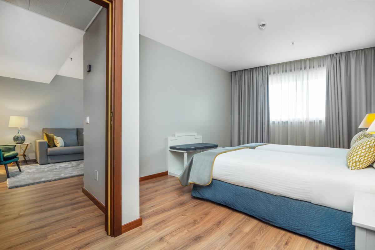 Uma cama ou camas num quarto em Gaia Residence