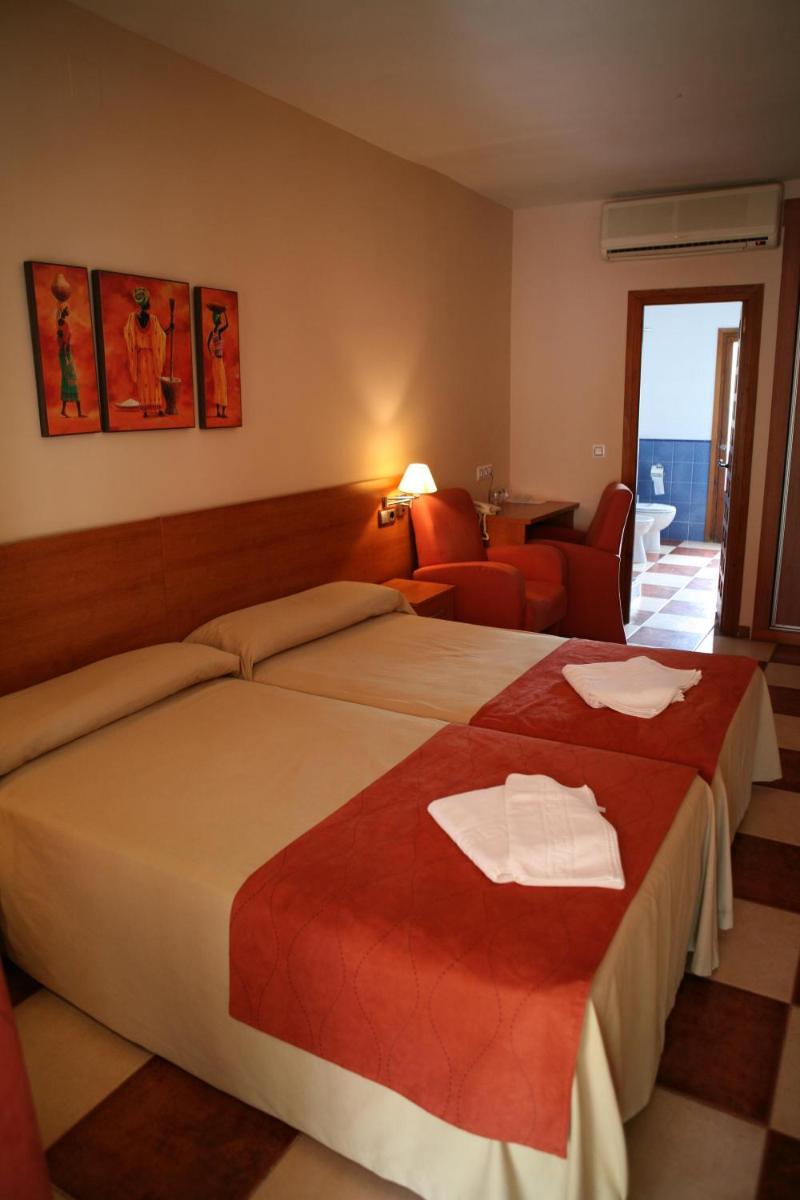 Cama o camas de una habitación en Balneario San Andres