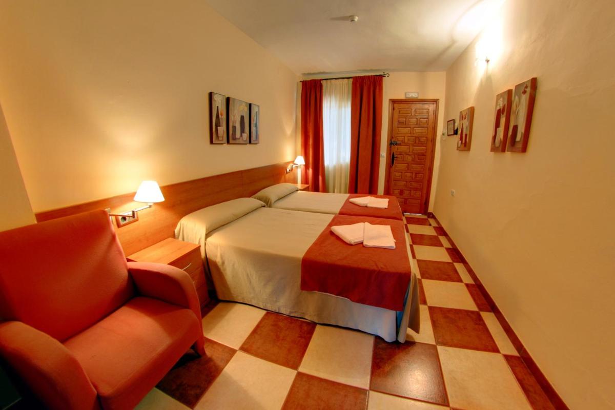 Cama o camas de una habitación en Balneario San Andres