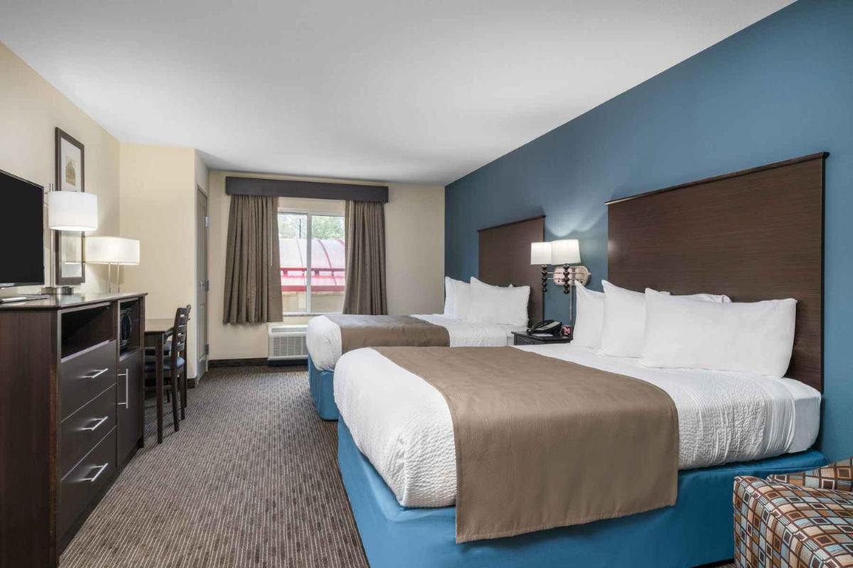 AmericInn by Wyndham Windom - Housity
