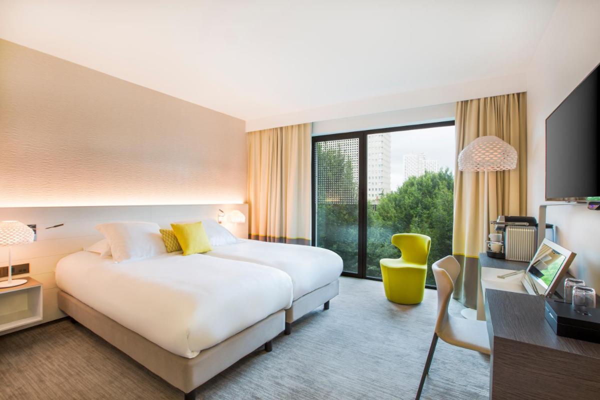 Un ou plusieurs lits dans un hébergement de l'établissement BW Premier Collection Le Saint Antoine Hotel et Spa
