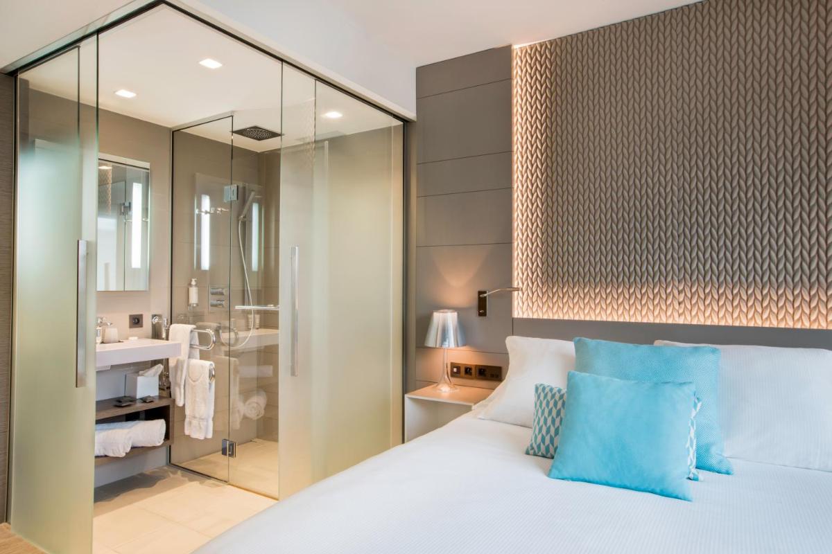 Un ou plusieurs lits dans un hébergement de l'établissement BW Premier Collection Le Saint Antoine Hotel et Spa