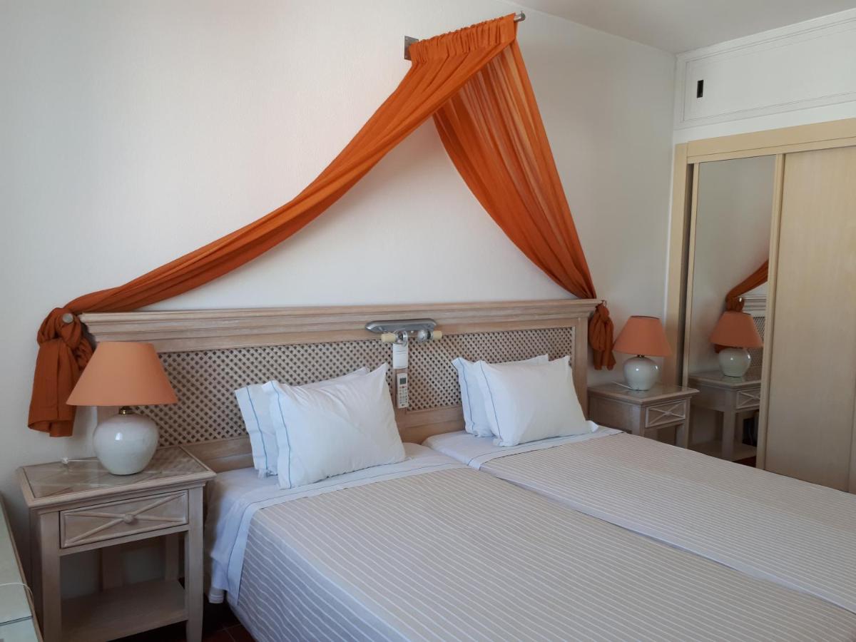 Uma cama ou camas num quarto em Hotel do Cerro