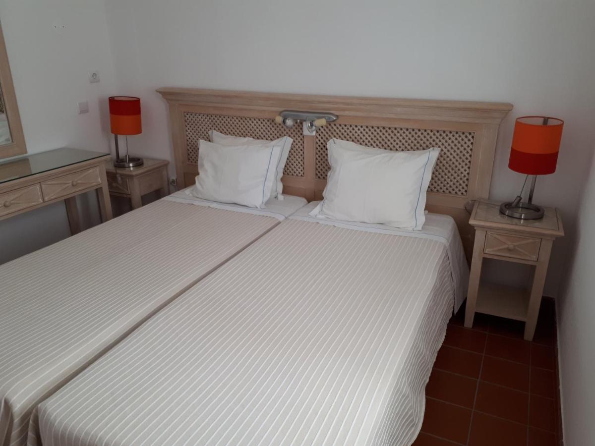 Uma cama ou camas num quarto em Hotel do Cerro
