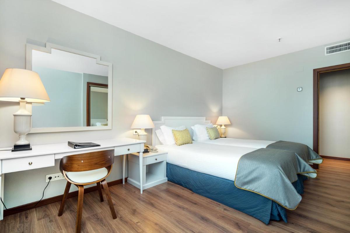 Uma cama ou camas num quarto em Gaia Residence