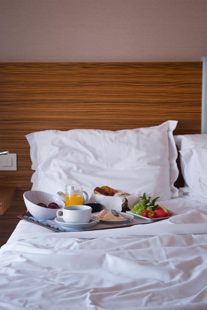 Uma cama ou camas num quarto em Hotel Meira