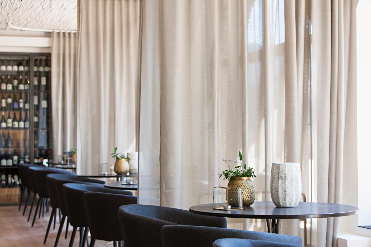 Un restaurante o sitio para comer en Terra Dominicata - Hotel & Winery - Adults Only