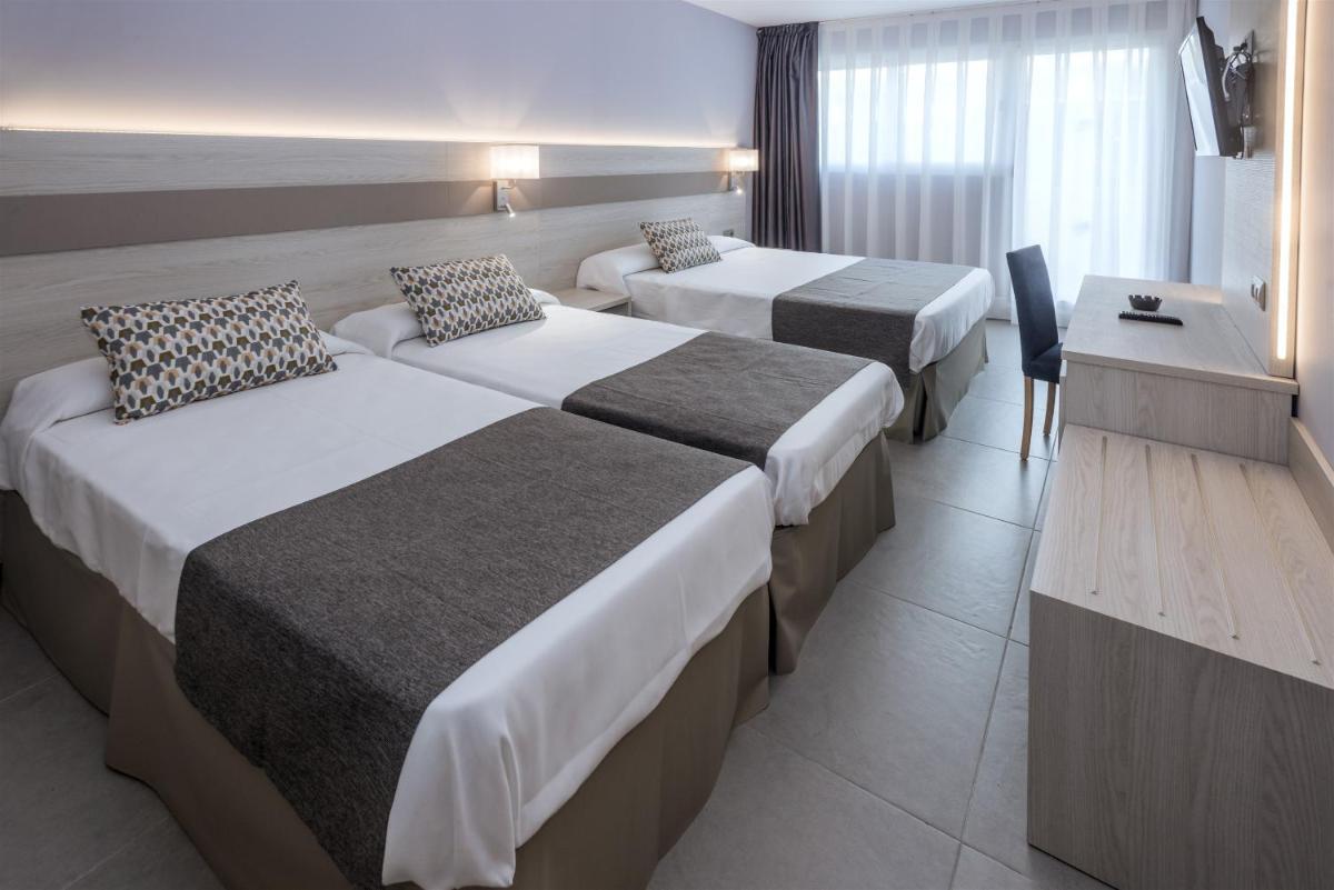 Cama o camas de una habitación en 4R Salou Park Resort I