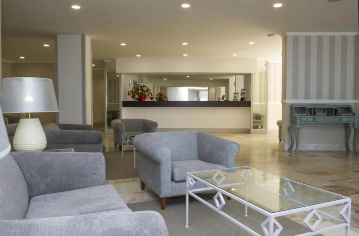 Uma área de estar em Florasol Residence Hotel - Dorisol hotels
