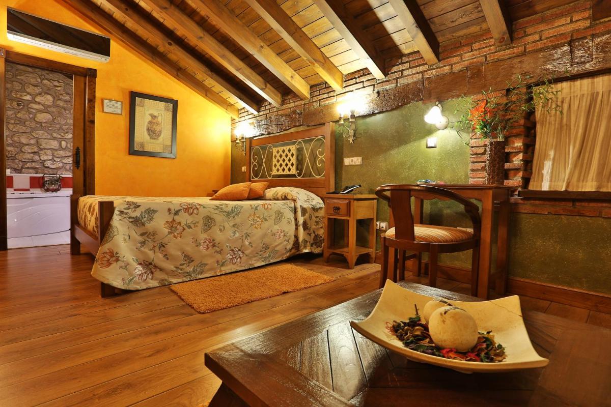 Cama o camas de una habitación en Hotel Spa Casona La Hondonada