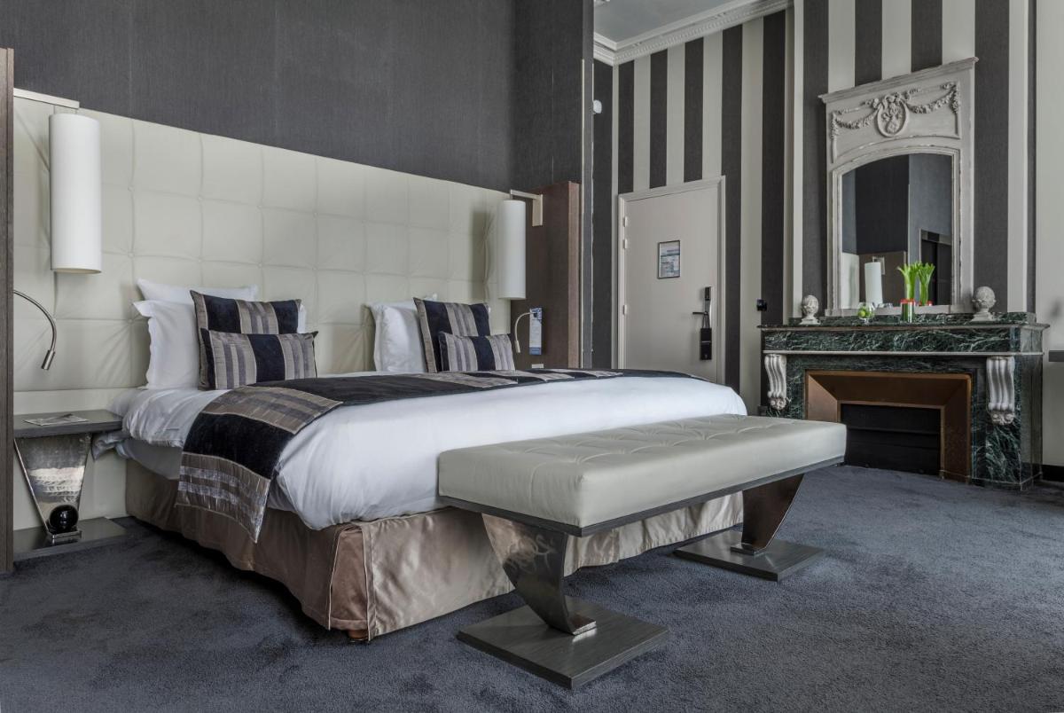 Un ou plusieurs lits dans un hébergement de l'établissement La Cour des Consuls Hotel & Spa Toulouse - MGallery Collection