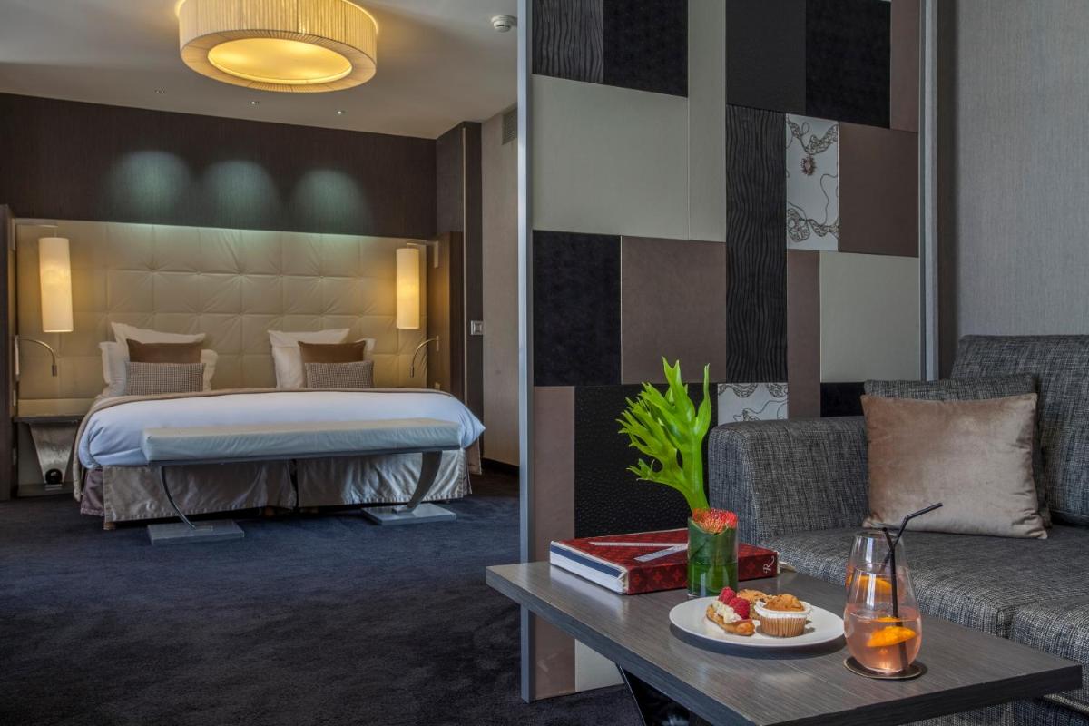 Un ou plusieurs lits dans un hébergement de l'établissement La Cour des Consuls Hotel & Spa Toulouse - MGallery Collection