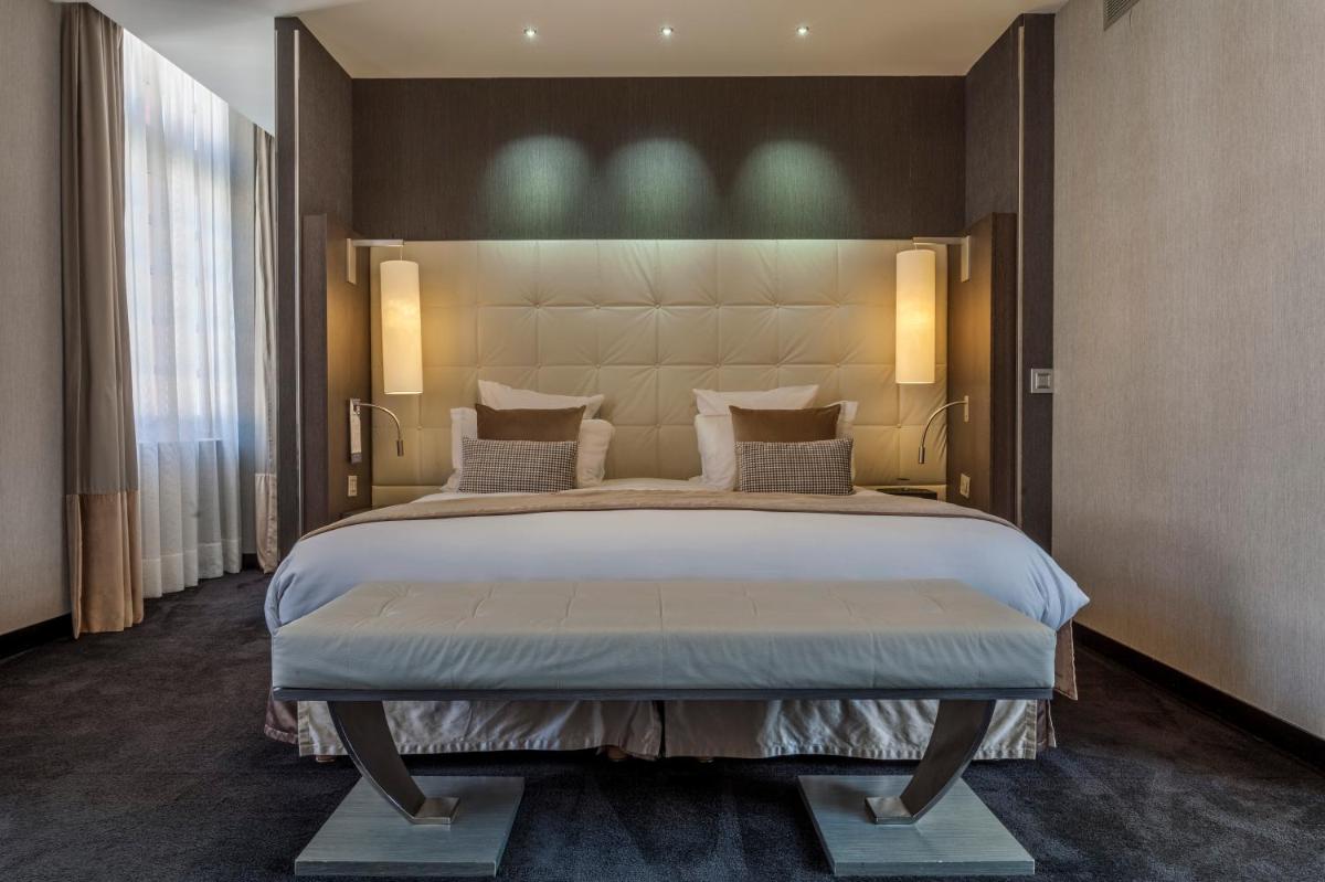 Un ou plusieurs lits dans un hébergement de l'établissement La Cour des Consuls Hotel & Spa Toulouse - MGallery Collection