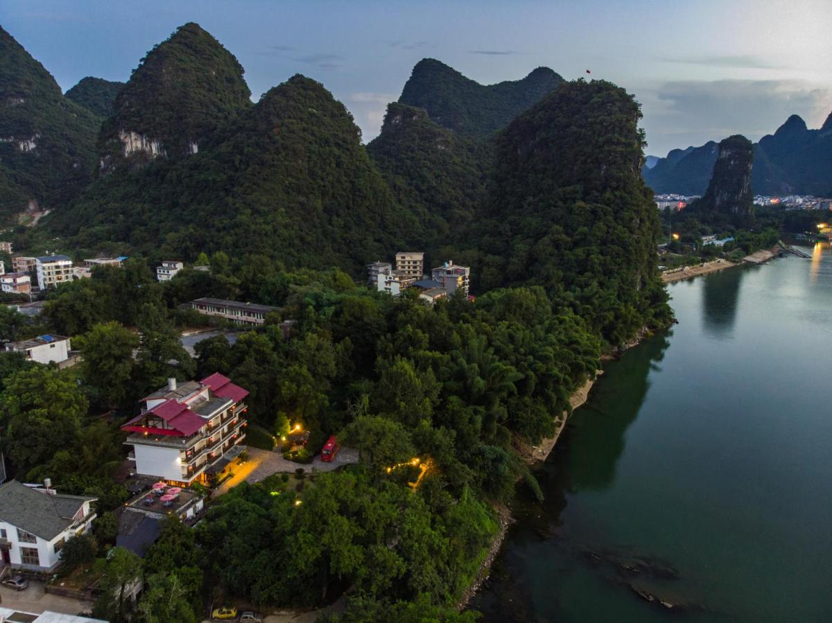 Yangshuo River Lodge Hotel-Free pick up from Yangshuo Area over three nights - Housity