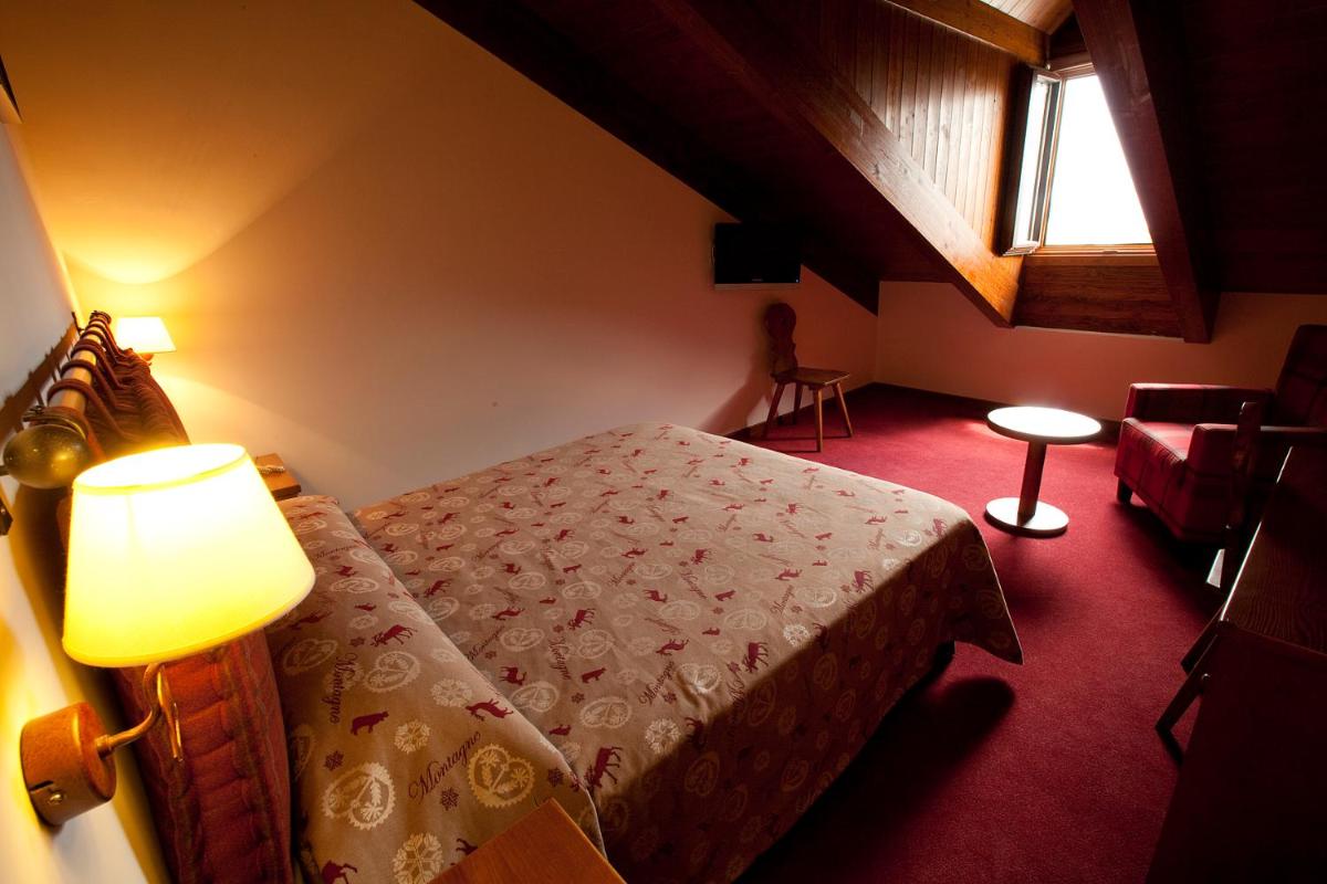Cama o camas de una habitación en Hotel La Morera