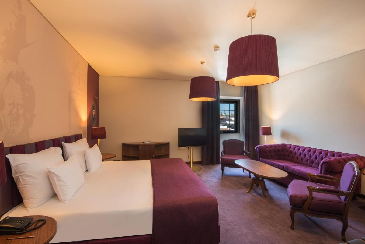 Uma cama ou camas num quarto em Vila Gale Collection Braga