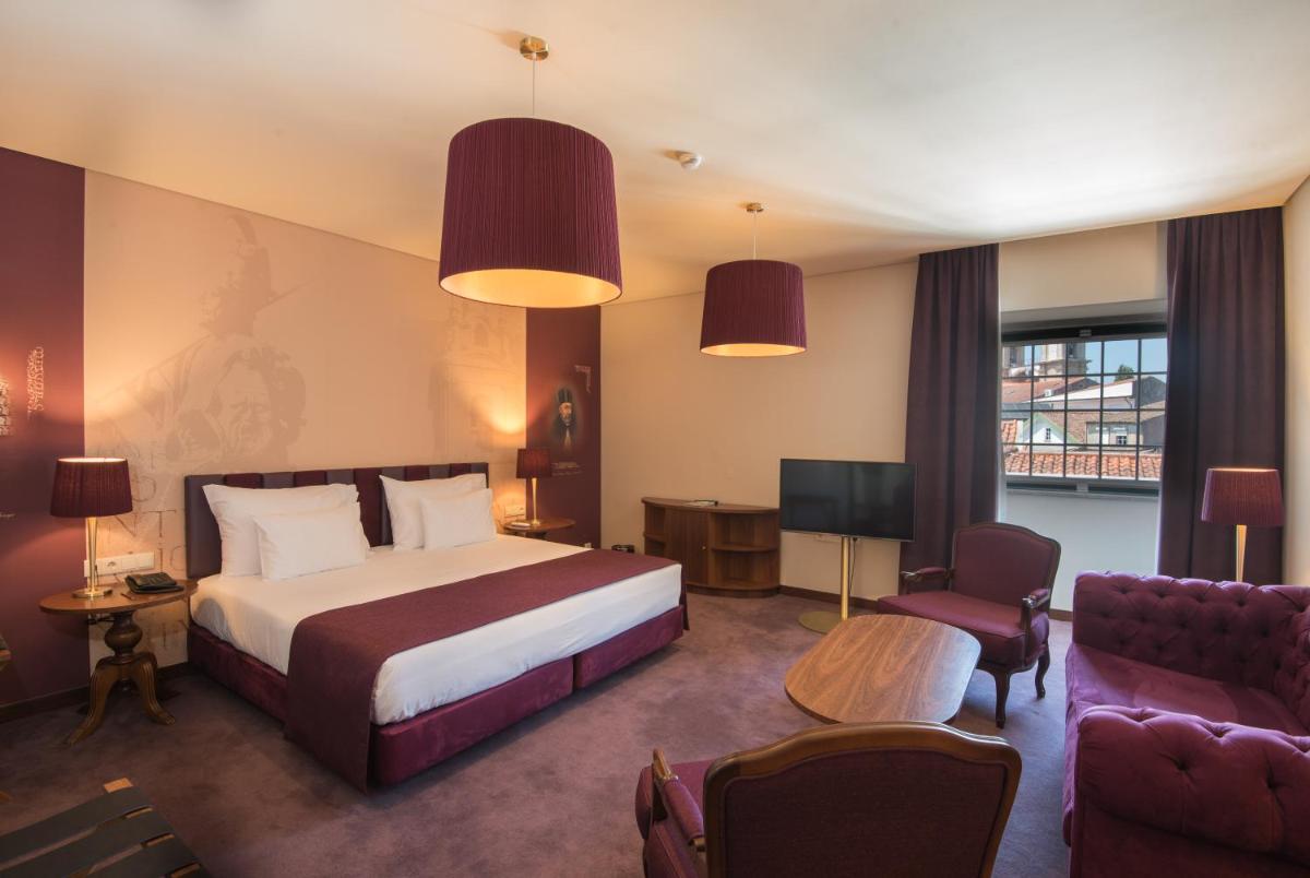 Uma cama ou camas num quarto em Vila Gale Collection Braga