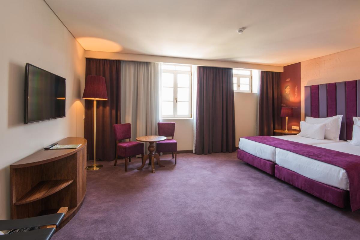 Uma cama ou camas num quarto em Vila Gale Collection Braga